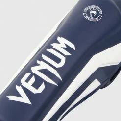 MUAY THAI VENUM ELITE STANDUP SHIN GUARDS - WHITE/NAVY BLUE