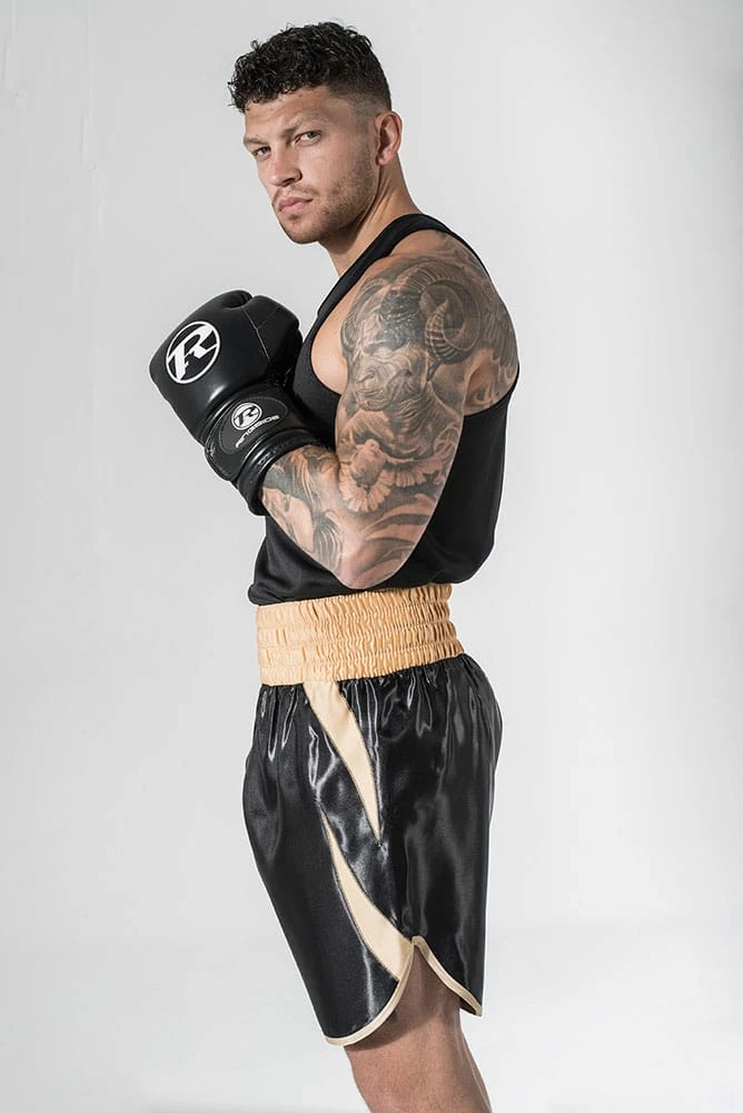 SUZI WONG BLACK & GOLD SHEEDY CURVED BOXING SHORTS CLOTHING 2 SUZI WONG BLACK & GOLD SHEEDY CURVED BOXING SHORTS CLOTHING