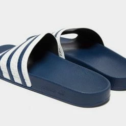 Adidas Originals Adilette Sliders In Blue And White